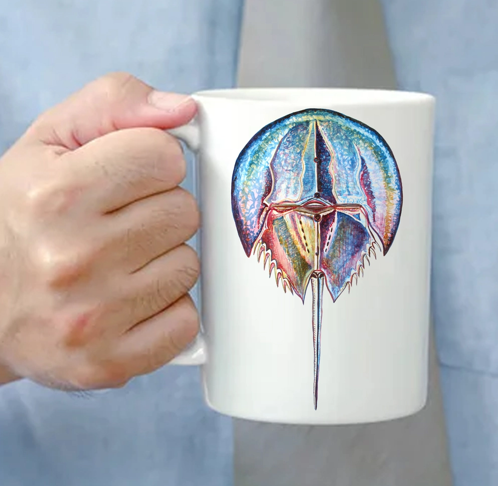 The Ship's Hold Watercolor Artwork 15oz Ceramic Mug, Colorful Horseshoe Crab (individual in hand) The Ship's Hold Watercolor Artwork 15oz Ceramic Mug, Colorful Horseshoe Crab (individual in hand)