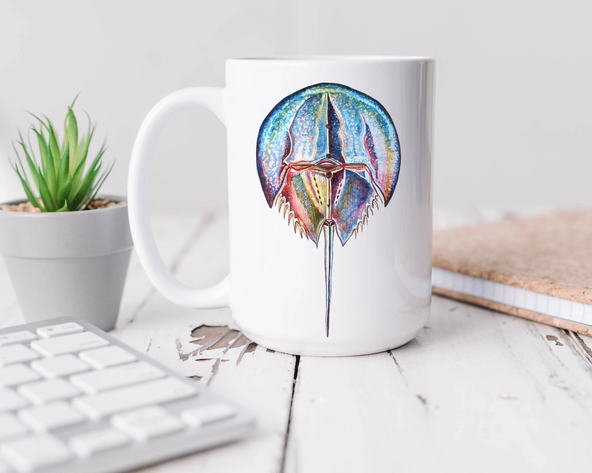 The Ship's Hold Watercolor Artwork 15oz Ceramic Mug, Colorful Horseshoe Crab (individual on table) The Ship's Hold Watercolor Artwork 15oz Ceramic Mug, Colorful Horseshoe Crab (individual on table)