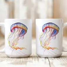 The Ship's Hold Watercolor Artwork 15oz Ceramic Mug, Colorful Jellyfish (pair on table)